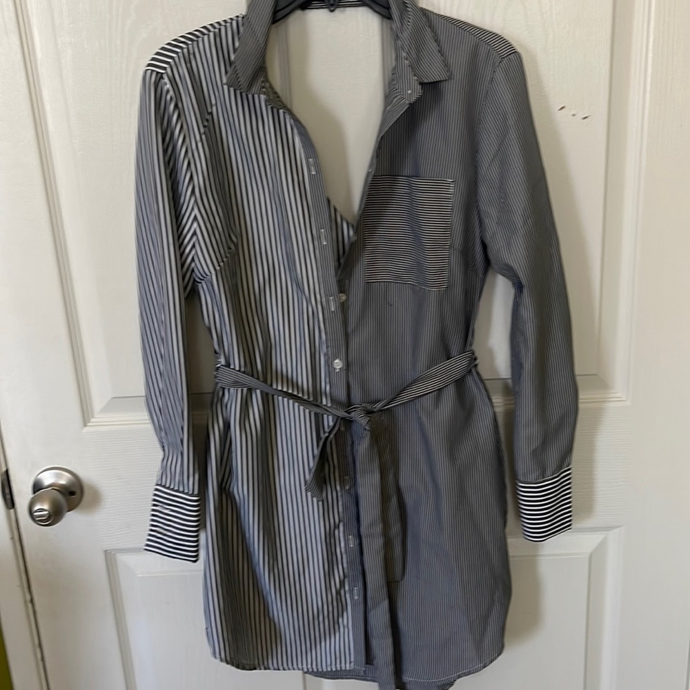 Grey and white stripped dress shirt with v cutout in back with a tie belt